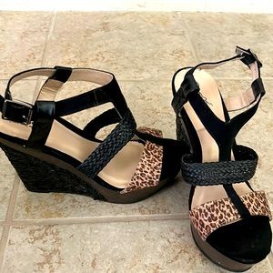 Size 8, black and animal print wedge